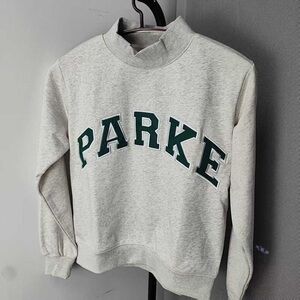 Parke Women's Cream Crew Neck Sweater with Green Lettering